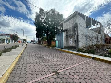 TERRENO CON CONSTRUCCION