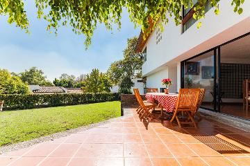 CASA CON JARDIN EN CONDOMINIO HORIZONTAL